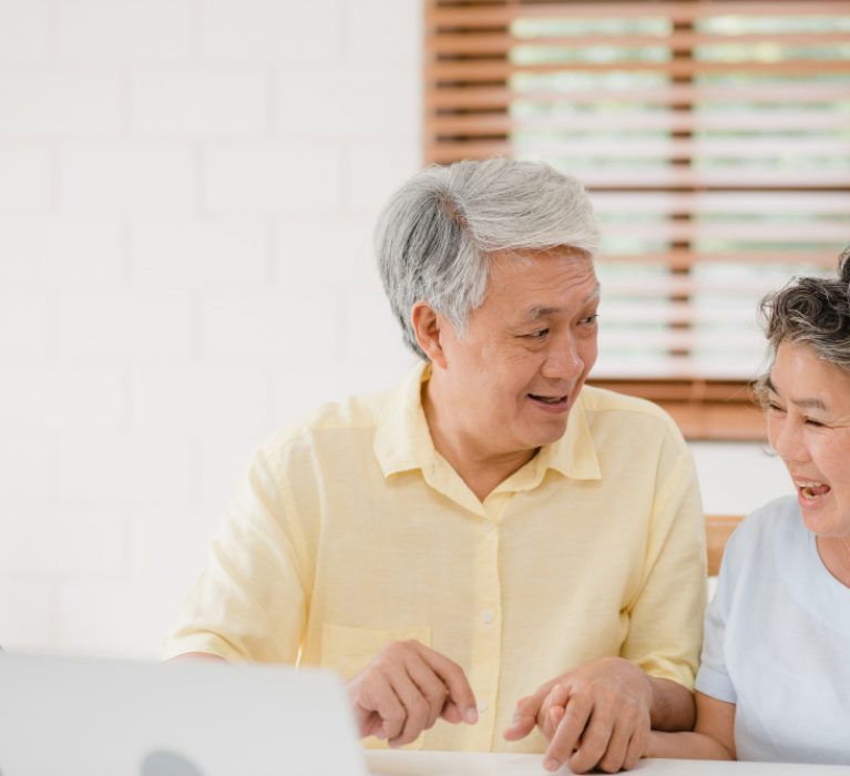 asia-smart-female-agent-offers-health-insurance-elderly-couples-by-document-tablet-laptop.jpg